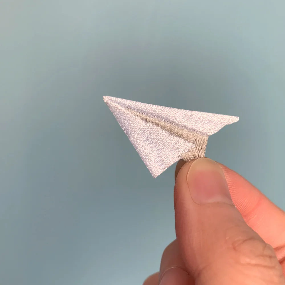 Choose from Colorful paper airplane iron-on patches