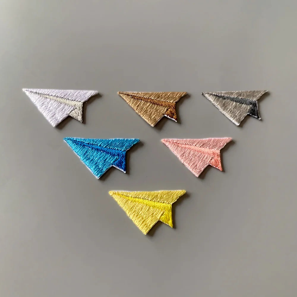 Choose from Colorful paper airplane iron-on patches