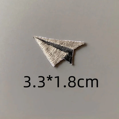 Choose from Colorful paper airplane iron-on patches