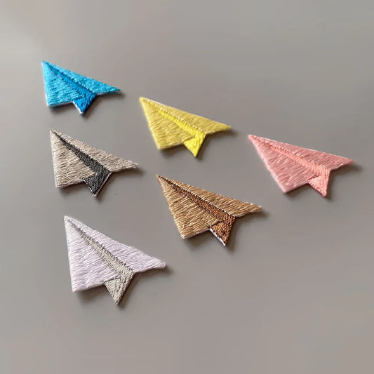 Choose from Colorful paper airplane iron-on patches